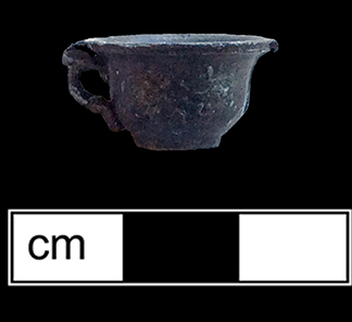 Cast copper alloy or Britannia metal (pewter alloy) toy tea cup. 1.5cm x 1.5cm - from 18BC27.